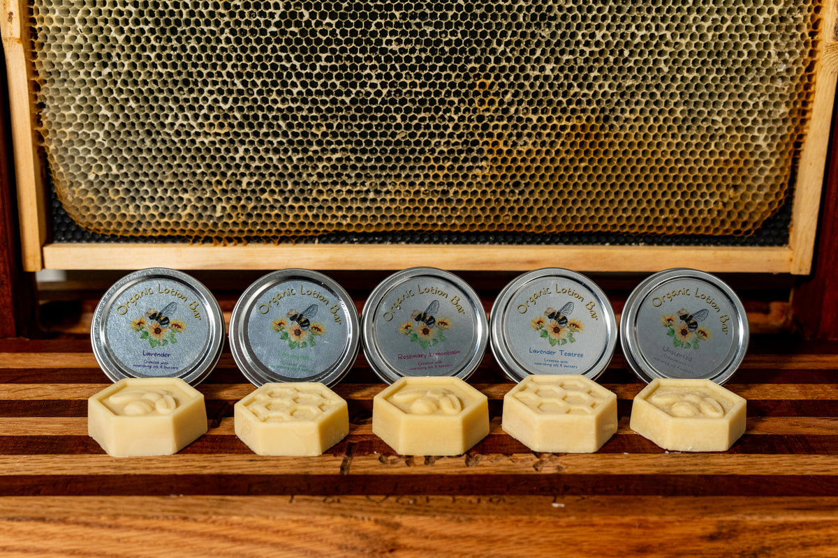 Honey Moon Farms display of their 5 scents of lotion bars